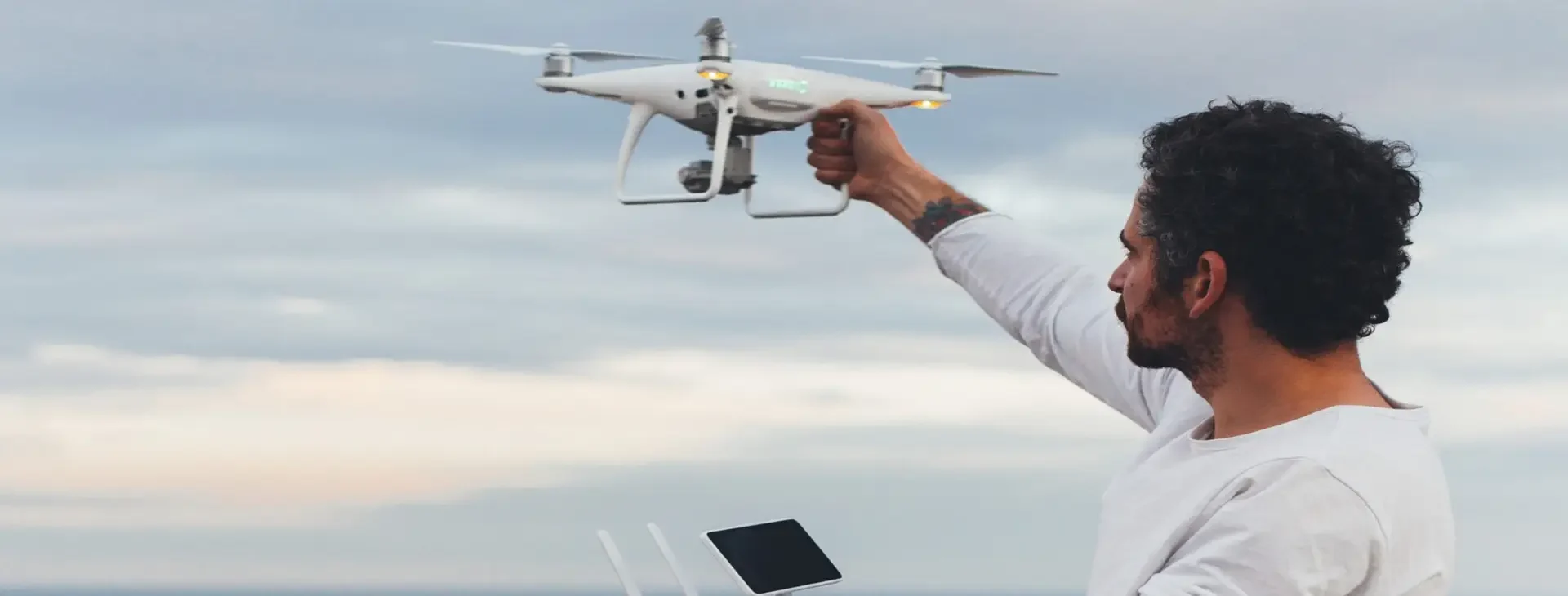 drone pilot photographer prepares launch flight